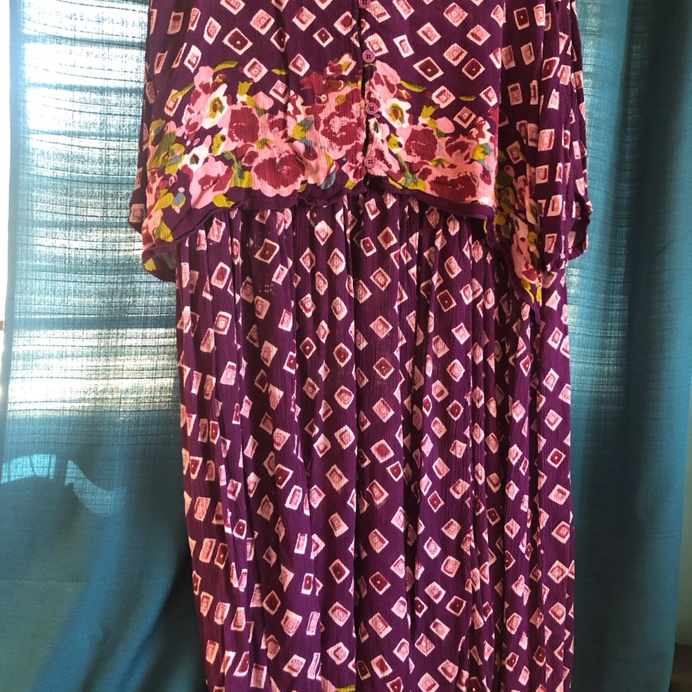 Semi-formal 100% rayon. Plum print. 44in Length. 3/4 sleeves. Machine wash cold.